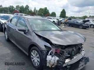 2022 Toyota Camry Hybrid LE with VIN 4T1C31AK9NU036999, listed as a IAAI auction lot 42741455 with 68,970 mi miles and . Bid and sale history available at DreamBid. Image 1.