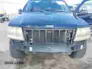 2004 Jeep Grand Cherokee Laredo with VIN 1J4GW48N34C357627, listed as a IAAI auction lot 42672019 with 249,510 mi miles and . Bid and sale history available at DreamBid. Image 6.