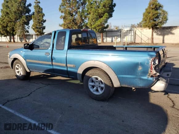2002 Nissan Frontier XE with VIN 1N6DD26S22C322020, listed as a Copart auction lot 86885285 with 94,964 mi miles and Clean title. Bid and sale history available at DreamBid. Image 2.