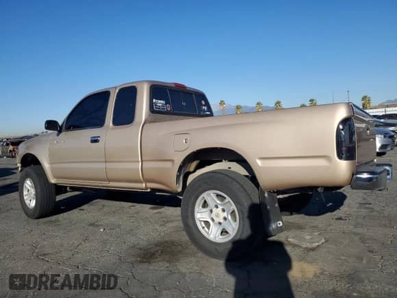 1997 Toyota Tacoma z VIN 4TAWM72NXVZ328170, wystawiony jako Copart lot #81649744 z przebiegiem 171 620 mil mil oraz Szkoda całkowita • Salvage title. Historia ofert i sprzedaży dostępna na DreamBid. Obrazek 2.