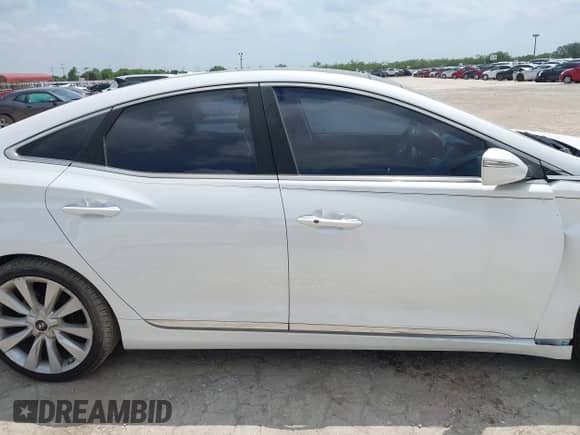 2015 Hyundai Azera Limited с VIN KMHFH4JG1FA476455, выставлен на аукционе IAAI как лот 42407261 с пробегом 110 293 миль миль и . История ставок и продаж доступна на DreamBid. Изображение 13.