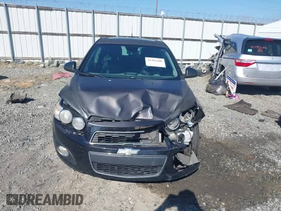 2013 Chevrolet Sonic LTZ with VIN 1G1JE6SH9D4100004, listed as a IAAI auction lot 41501606 with 122,973 mi miles and . Bid and sale history available at DreamBid. Image 12.