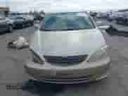 2003 Toyota Camry LE z VIN 4T1BE32KX3U771892, wystawiony jako IAAI lot #43396787 z przebiegiem 74 369 mil mil oraz . Historia ofert i sprzedaży dostępna na DreamBid. Obrazek 12.