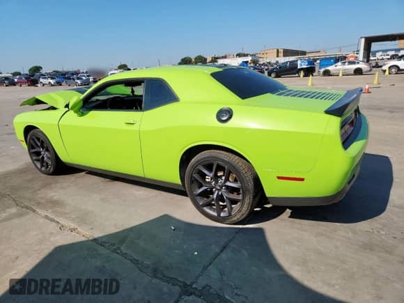 2023 Dodge Challenger SXT with VIN 2C3CDZAG3PH554144, listed as a Copart auction lot 70311265 with 55,494 mi miles and Salvage title. Bid and sale history available at DreamBid. Image 2.