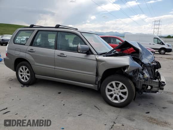 2006 Subaru Forester X z VIN JF1SG65656H709849, wystawiony jako Copart lot #59811325 z przebiegiem 198 659 mil mil oraz Szkoda całkowita • Salvage title. Historia ofert i sprzedaży dostępna na DreamBid. Obrazek 4.