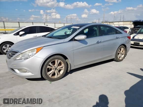 2012 Hyundai Sonata Limited с VIN 5NPEC4AC0CH371809, выставлен на аукционе Copart как лот 85650355 с пробегом 166 104 миль миль и Списание • Salvage title. История ставок и продаж доступна на DreamBid. Изображение 1.