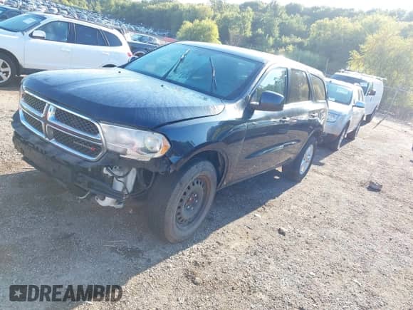 2013 Dodge Durango SXT with VIN 1C4RDJAG1DC695624, listed as a IAAI auction lot 43134491 with 219,799 mi miles and . Bid and sale history available at DreamBid. Image 17.