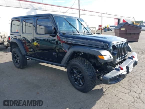 2021 Jeep Wrangler Unlimited Willys with VIN 1C4HJXDM0MW683276, listed as a IAAI auction lot 41896423 with 70,935 mi miles and . Bid and sale history available at DreamBid. Image 1.