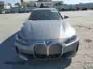 2025 BMW i4 xDrive40 with VIN WBY43HD05SFU20563, listed as a Copart auction lot 85369775 with 3,356 mi miles and Salvage title. Bid and sale history available at DreamBid. Image 5.