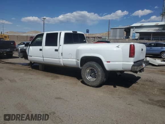 2000 Chevrolet Silverado 3500 с VIN 1GCHK33J2YF420533, выставлен на аукционе Copart как лот 54063355 с пробегом 96 445 миль миль и Списание • Salvage title. История ставок и продаж доступна на DreamBid. Изображение 2.