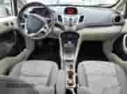 2012 Ford Fiesta SE with VIN 3FADP4BJ6CM126249, listed as a Copart auction lot 55529395 with 119,770 mi miles and Salvage title. Bid and sale history available at DreamBid. Image 8.