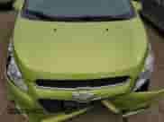 2014 Chevrolet Spark LT with VIN KL8CC6S99EC412600, listed as a Copart auction lot 44596965 with 102,372 mi miles and Salvage title. Bid and sale history available at DreamBid. Image 11.