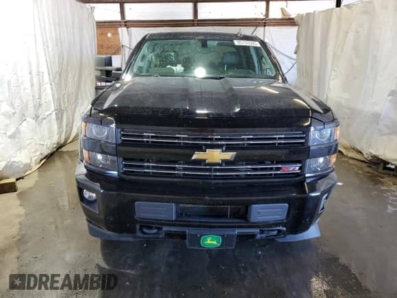 2017 Chevrolet Silverado 2500HD LTZ с VIN 1GC1KWEG2HF175057, выставлен на аукционе Copart как лот 85135505 с пробегом 136 887 миль миль и Списание • Salvage title. История ставок и продаж доступна на DreamBid. Изображение 5.
