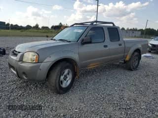 2004 Nissan Frontier XE z VIN 1N6ED29X34C403610, wystawiony jako Copart lot #81246175 z przebiegiem 215 015 mil mil oraz Czysty tytuł • Clean title. Historia ofert i sprzedaży dostępna na DreamBid. Obrazek 1.