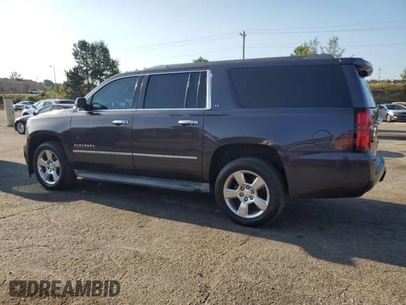 2015 Chevrolet Suburban LT с VIN 1GNSKJKC3FR123965, выставлен на аукционе Copart как лот 80460945 с пробегом 234 571 миль миль и Чистый • Clean title. История ставок и продаж доступна на DreamBid. Изображение 2.