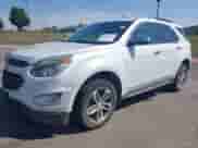 2016 Chevrolet Equinox LTZ z VIN 2GNALDEK9G6135113, wystawiony jako IAAI lot #43178441 z przebiegiem 99 289 mil mil oraz . Historia ofert i sprzedaży dostępna na DreamBid. Obrazek 2.