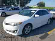 2014 Toyota Camry SE with VIN 4T1BF1FK3EU809509, listed as a IAAI auction lot 43321909 with 212,454 mi miles and . Bid and sale history available at DreamBid. Image 2.