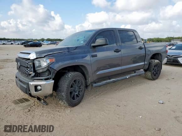 2020 Toyota Tundra SR5 with VIN 5TFDY5F15LX945111, listed as a Copart auction lot 70679165 with 147,342 mi miles and Salvage title. Bid and sale history available at DreamBid. Image 1.