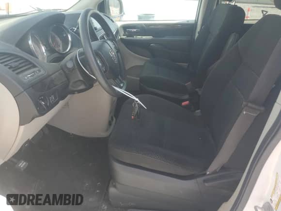 2020 Dodge Grand Caravan SE with VIN 2C4RDGBG2LR221690, listed as a Copart auction lot 80886935 with 60,677 mi miles and Salvage title. Bid and sale history available at DreamBid. Image 7.