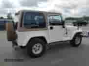 1999 Jeep Wrangler Sahara z VIN 1J4FY49S0XP432968, wystawiony jako Copart lot #65033715 z przebiegiem 126 420 mil mil oraz Szkoda całkowita • Salvage title. Historia ofert i sprzedaży dostępna na DreamBid. Obrazek 3.