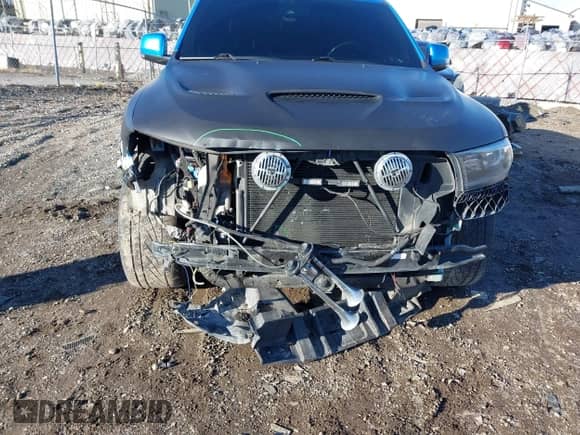 2018 Dodge Durango SRT with VIN 1C4SDJGJ1JC415720, listed as a IAAI auction lot 41193674 with 63,140 mi miles and . Bid and sale history available at DreamBid. Image 6.