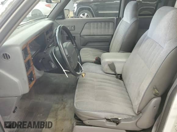 1994 Dodge Dakota z VIN 1B7GL23X7RS709259, wystawiony jako Copart lot #61671365 z przebiegiem 246 935 mil mil oraz Szkoda całkowita • Salvage title. Historia ofert i sprzedaży dostępna na DreamBid. Obrazek 7.