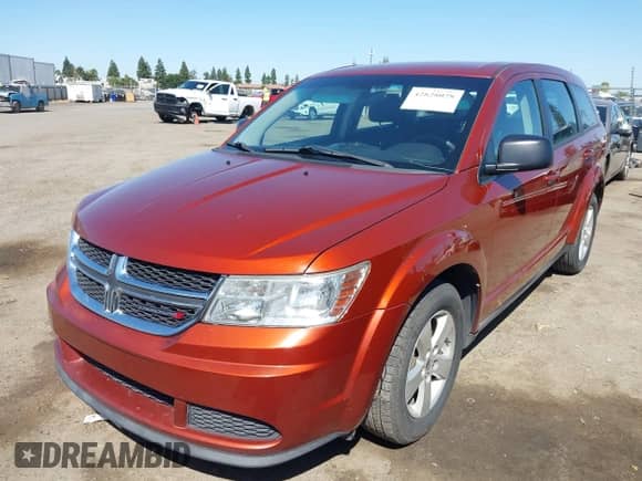 2013 Dodge Journey American Value z VIN 3C4PDCAB1DT626671, wystawiony jako IAAI lot #42828028 z przebiegiem 238 028 mil mil oraz . Historia ofert i sprzedaży dostępna na DreamBid. Obrazek 19.