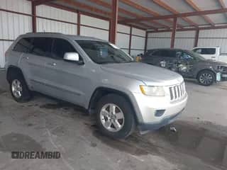 2011 Jeep Grand Cherokee Laredo with VIN 1J4RS4GG6BC524387, listed as a IAAI auction lot 43177439 with 136,475 mi miles and . Bid and sale history available at DreamBid. Image 1.