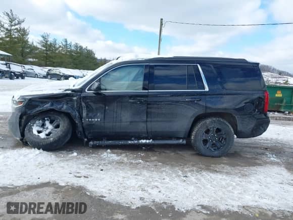 2019 Chevrolet Tahoe LS with VIN 1GNSKAKC9KR336283, listed as a IAAI auction lot 41280975 with 85,682 mi miles and . Bid and sale history available at DreamBid. Image 14.
