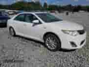 2014 Toyota Camry LE with VIN 4T1BD1FK2EU097533, listed as a Copart auction lot 71321915 with 127,214 mi miles and Salvage title. Bid and sale history available at DreamBid. Image 4.