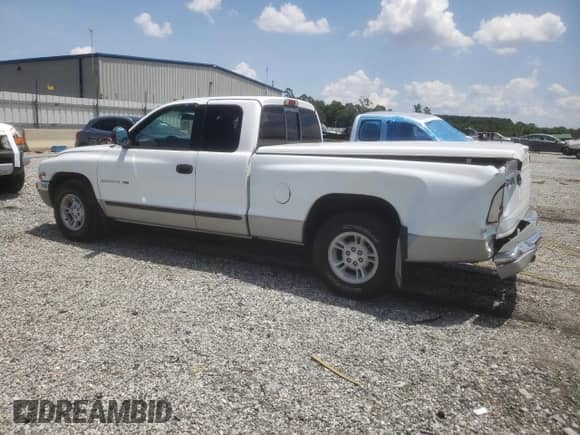 1998 Dodge Dakota SLT with VIN 1B7GL22X7WS653594, listed as a Copart auction lot 65887935 with 151,703 mi miles and Salvage title. Bid and sale history available at DreamBid. Image 2.