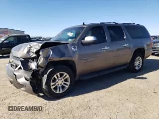 2013 Chevrolet Suburban LS с VIN 1GNSCHE01DR323733, выставлен на аукционе Copart как лот 42207495 с пробегом 147 072 миль миль и Списание • Salvage title. История ставок и продаж доступна на DreamBid. Изображение 1.