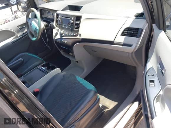 2013 Toyota Sienna SE with VIN 5TDXK3DC0DS364467, listed as a IAAI auction lot 42404833 with 126,857 mi miles and . Bid and sale history available at DreamBid. Image 5.