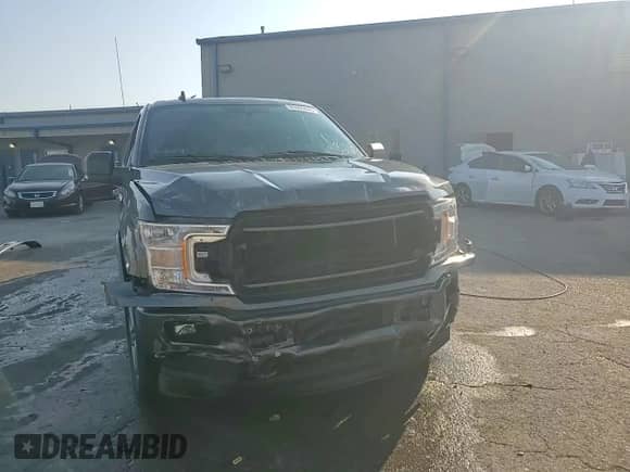 2019 Ford F-150 XLT with VIN 1FTEW1EP7KFA78291, listed as a Copart auction lot 80905865 with 64,304 mi miles and Salvage title. Bid and sale history available at DreamBid. Image 14.