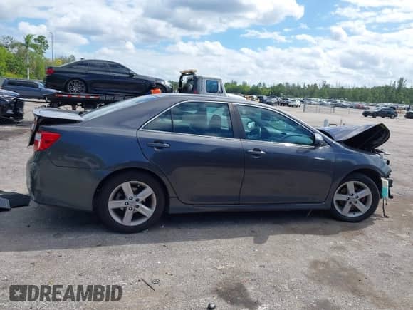 2013 Toyota Camry LE z VIN 4T1BF1FK6DU225796, wystawiony jako IAAI lot #43475385 z przebiegiem 160 867 mil mil oraz . Historia ofert i sprzedaży dostępna na DreamBid. Obrazek 14.