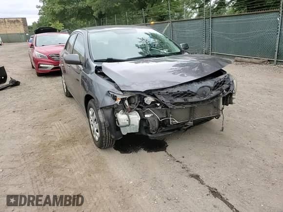 2011 Toyota Corolla L z VIN 2T1BU4EE3BC719941, wystawiony jako Copart lot #69679225 z przebiegiem 108 818 mil mil oraz Szkoda całkowita • Salvage title. Historia ofert i sprzedaży dostępna na DreamBid. Obrazek 14.