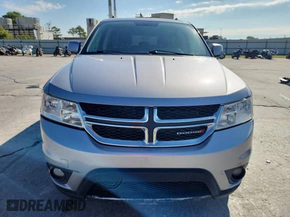 2017 Dodge Journey SXT with VIN 3C4PDCBG9HT572469, listed as a Copart auction lot 81464005 with 77,095 mi miles and Salvage title. Bid and sale history available at DreamBid. Image 5.