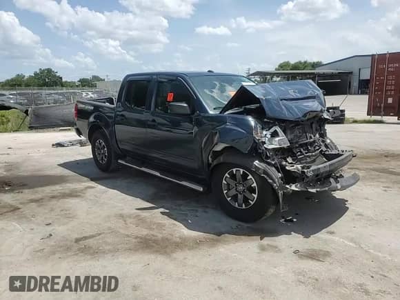 2017 Nissan Frontier Desert Runner with VIN 1N6DD0ER6HN744632, listed as a Copart auction lot 60755185 with 87,037 mi miles and Salvage title. Bid and sale history available at DreamBid. Image 14.
