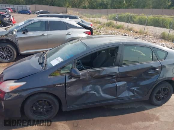 2012 Toyota Prius Four with VIN JTDKN3DU5C1514871, listed as a IAAI auction lot 42862336 with 132,973 mi miles and . Bid and sale history available at DreamBid. Image 14.