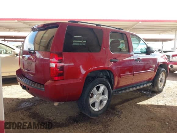 2007 Chevrolet Tahoe LT with VIN 1GNFC13J07R225074, listed as a IAAI auction lot 43396432 with 214,881 mi miles and . Bid and sale history available at DreamBid. Image 4.