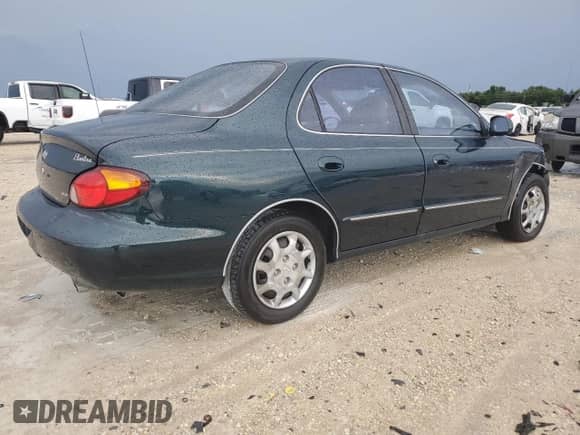 2000 Hyundai Elantra GLS с VIN KMHJF35F3YU002102, выставлен на аукционе Copart как лот 73243004 с пробегом 79 155 миль миль и Списание • Salvage title. История ставок и продаж доступна на DreamBid. Изображение 3.
