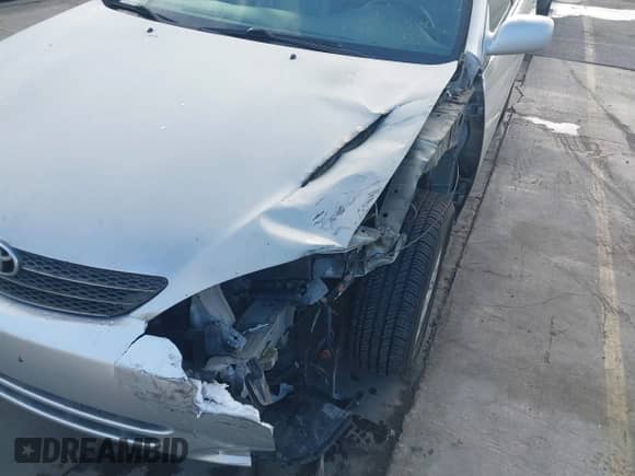 2003 Toyota Camry LE z VIN 4T1BF30K33U559514, wystawiony jako IAAI lot #43518376 z przebiegiem 203 514 mil mil oraz . Historia ofert i sprzedaży dostępna na DreamBid. Obrazek 12.