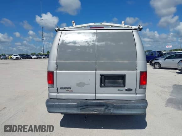 2014 Ford Econoline Cargo Commercial with VIN 1FTNE1EW4EDB05697, listed as a IAAI auction lot 42899014 with 216,329 mi miles and . Bid and sale history available at DreamBid. Image 16.