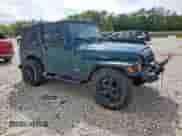 1999 Jeep Wrangler Sport with VIN 1J4FY19S7XP435204, listed as a Copart auction lot 83820835 with 263,738 mi miles and Clean title. Bid and sale history available at DreamBid. Image 4.