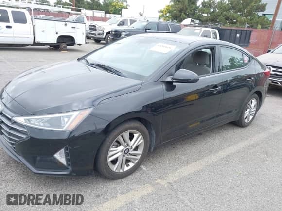 2020 Hyundai Elantra SEL z VIN 5NPD84LF7LH571476, wystawiony jako IAAI lot #43203656 z przebiegiem 81 832 mil mil oraz . Historia ofert i sprzedaży dostępna na DreamBid. Obrazek 2.