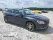 2015 Volvo S60 T6 Drive-E with VIN YV149MFK3F1349819, listed as a Copart auction lot 66590114 with 166,860 mi miles and Salvage title. Bid and sale history available at DreamBid. Image 4.