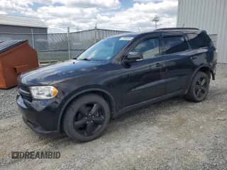 2011 Dodge Durango Citadel with VIN 1D4SE5GT9BC688107, listed as a Copart auction lot 57092645 with 115,637 mi miles and Salvage title. Bid and sale history available at DreamBid. Image 1.