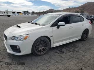 2016 Subaru WRX Premium with VIN JF1VA1E61G9816507, listed as a Copart auction lot 83974475 with 89,548 mi miles and Salvage title. Bid and sale history available at DreamBid. Image 1.