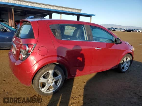 2012 Chevrolet Sonic LTZ с VIN 1G1JF6SB8C4126147, выставлен на аукционе Copart как лот 80798484 с пробегом 50 000 миль миль и Чистый • Clean title. История ставок и продаж доступна на DreamBid. Изображение 3.