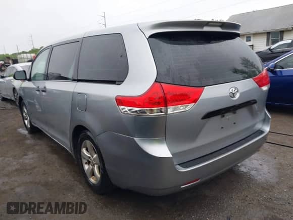 2014 Toyota Sienna L with VIN 5TDZK3DC7ES458064, listed as a IAAI auction lot 42192536 with 476,631 mi miles and . Bid and sale history available at DreamBid. Image 3.
